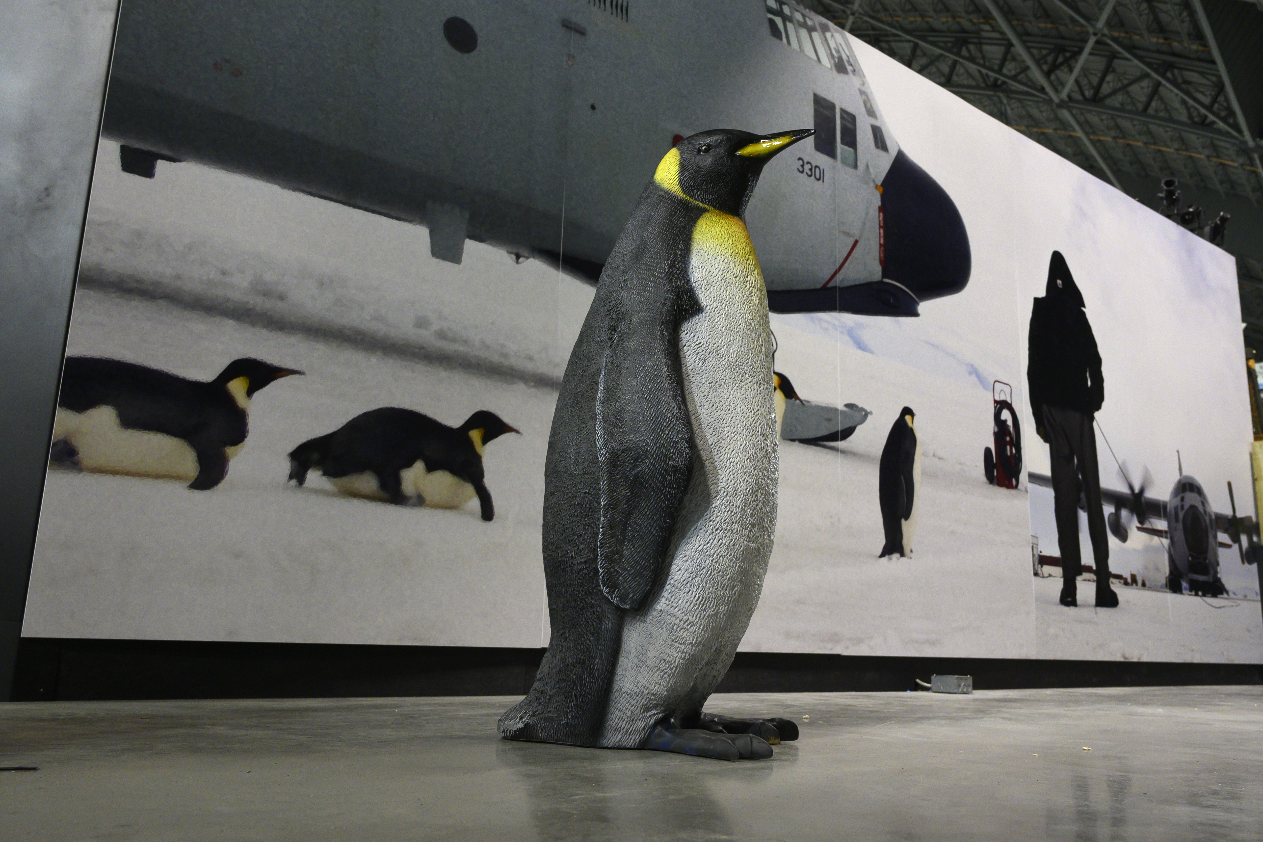A penguin statue represents one of the many Humanitarian missions conducted by the Department of the Air Force