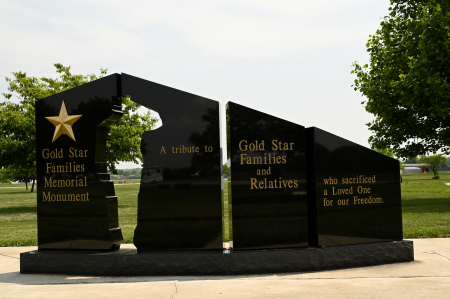 Image of the large black granite gold star families memorial in memorial park